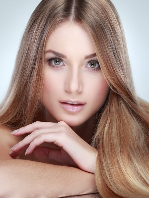 Beautiful  girl, isolated on a light - grey  background, emotions, cosmetics